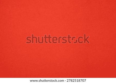 Solid red color background providing abstract texture for graphic design