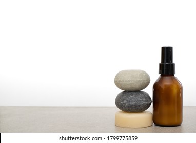 Solid Shampoo and conditioner bars and a glass bottle of deodorant
