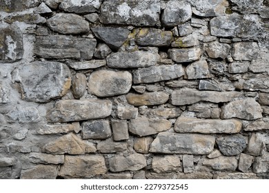 a solid stone wall in a fortified building. - Shutterstock ID 2279372545