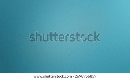 A solid teal blue background with a fine grain texture and uniform color. Clear details and vibra...