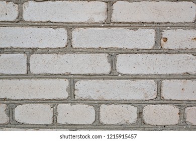 solid white color brick wall as abstract background. very simple texture. close up photo