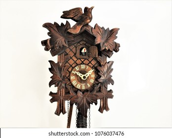 Solid woodcut carved antique cuckoo wall clock (1940's)