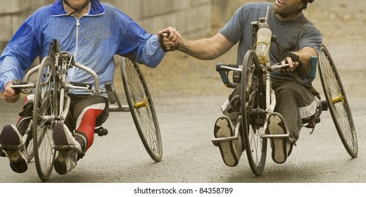 Solidarity At Handicap Sport Hand Bike