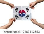 Solidarity and togetherness in South Korea, people helping each other, South Korea flag on 4 paper pieces, unity and help idea, support and charity concept, union of society