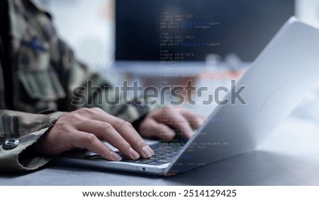 Solider hand type keyboard input configuration data ode for register system structure or unlock password on laptop in dark operation office room for cyber security and safety technology concept