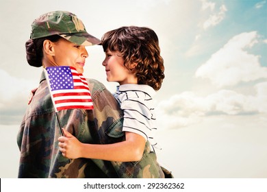 Solider reunited with son against blue sky - Powered by Shutterstock