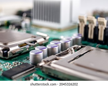 Solid-state capacitors on the motherboard of a desktop personal computer, server computer, electric batteries, computer repair, selective focus