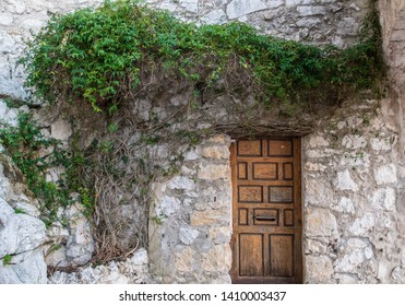 Solitary Door With Ivy In Eve, An Ancient Village In France, Cot