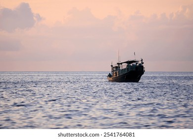 Solitary Fishing Boat at Sunset on Calm Ocean - Powered by Shutterstock