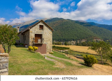 Solitary houses in the mountains of the natural park of ordesa huesca, spain