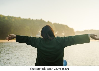 Solo Asian Woman Travel By Thai Local Bamboo Boat In Tropical Forest And Lake In Autumn Season