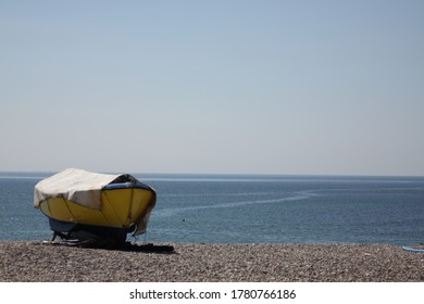 A Solo Boat Located In Beer In Dorset