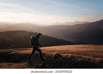 Solo Hiker Walking at Sunset on Mountain Ridge - Powered by Shutterstock