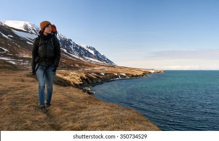 Solo Independent Asian Woman Traveler On Active Holiday, Hiking Trekking In Beautiful Natural Outdoor Landscape By The Ocean And Mountains