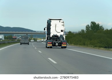 Solo lorry cab on empty highway