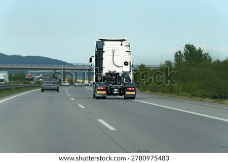 Solo lorry cab on empty highway