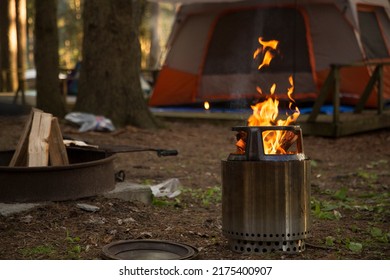 Solo stove at the campground - Shutterstock ID 2175400907