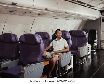 Solo traveler resting in nearly empty airplane cabin