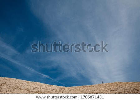 Similar – Image, Stock Photo Four people standing in a row on a ridge (2/2)