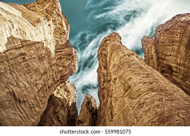 The Solomons Pillars  with blue cloudy sky viewed from below in Timna Park near to Eilat, Israel. (HDR image)