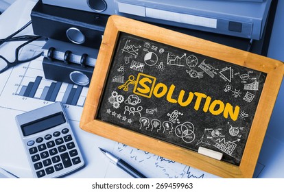 solution concept hand drawing on blackboard
