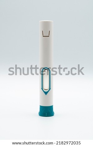 Solution for injection in pre-filled pen for subcutaneous use isolated on white background. Medicinal dose of 300 mg for single use, indicated for therapy with monoclonal antibody or insulin. 
