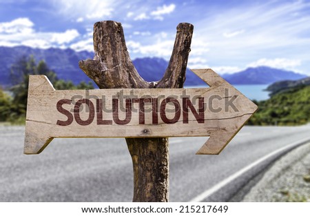 Solution sign with a landscape background
