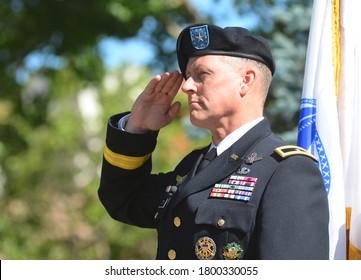 Solvang, California, USA - May 27, 2013: A United States Army Brigadier General Salutes During A Memorial Day Ceremony.