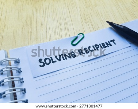 Solving recipient writting on table background. 