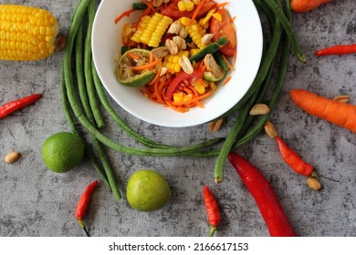 Som Tam Khao Pod Or Thai Spicy Corn Salad. Traditional Cuisine From Thailand Made From Corn, Carrot, String Bean, Lime, And Chili. 