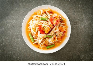 Som Tum - Thai Spicy green papaya salad with salty eggs - Asian food style - Powered by Shutterstock