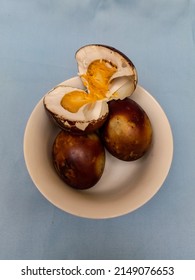 Some Baked Duck Eggs Served On White Glass Bowl As Sidedish. Photo Taken On Table With Light Blue Table Cloth As Background At Home. Bandung, Indonesia - Apr 23, 2022 At 13.17 Pm.