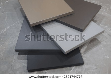 Some boards with different colour types of melamine faced chipboard