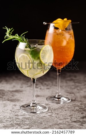 Some colored alcoholic cocktails on black background