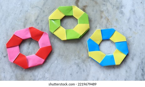 Some colorful origami donuts. The art of paper folding.