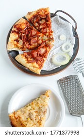 Some Delicious Pizza Slices, Consisting Of A Meatball Topping, Sausage, Cheese, A Splash Of Tomato Sauce And Barbecue, There Is Also A Pizza With A Tasty Tuna Mixture,shiny,on White Background