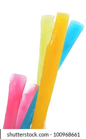 Some Freezer Pops Of Different Colors On A White Background