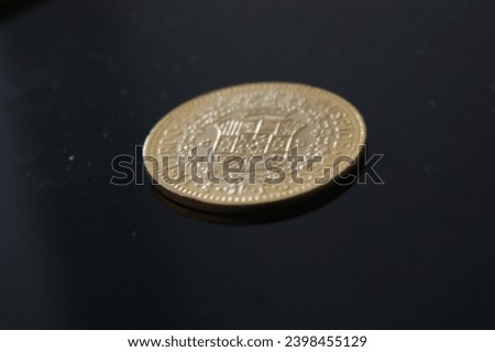 Some gold coins on a table