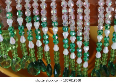 Some Green And White Plastic Bead Curtain