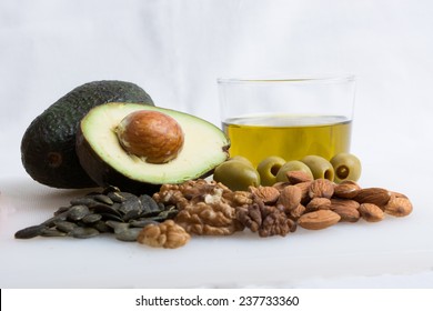 Some Healthy Food With Avocado, Nut, Olive Oil And Olive