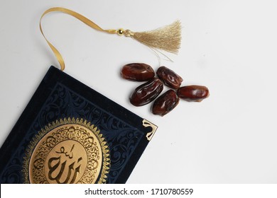 Some Kind Of Al Quran Book And Some Date Palm