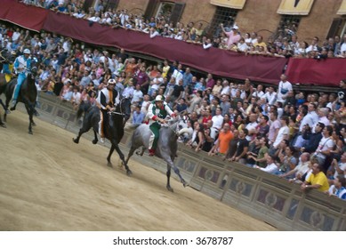 Some Moments Of The Horse Race Famous Around The World, Il Palio Di Siena. Slightly Motion Blur Gives The Sense Of Movement.