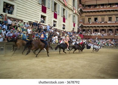 Some Moments Of The Horse Race Famous Around The World, Il Palio Di Siena. Slightly Motion Blur Gives The Sense Of Movement.