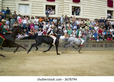 Some Moments Of The Horse Race Famous Around The World, Il Palio Di Siena. Slightly Motion Blur Gives The Sense Of Movement.