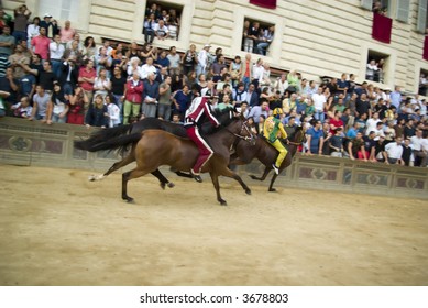 Some Moments Of The Horse Race Famous Around The World, Il Palio Di Siena. Slightly Motion Blur Gives The Sense Of Movement.