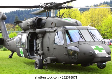 Some Natural And Man Made Disasters Require Rescue Services. This Is A Blackhawk Helicopter Being Used In A Mock Disaster Relief Rescue To Transport Victims To The Hospital.