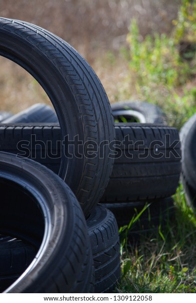 Some old tires for\
recycling