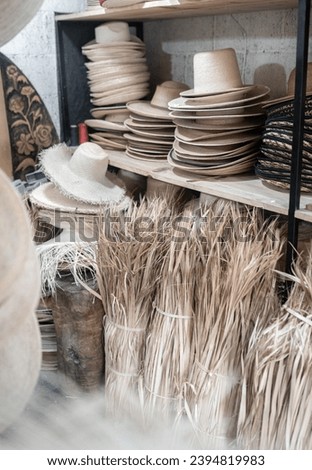 Some palm tree fiber stacks in a hat workshop