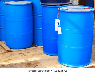 Some Plastic Blue Barrels On A Chemical Plant