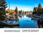 Some of the residences of the Tahoe Keys neighborhood and their private docks. Found in South Lake Tahoe, CA.